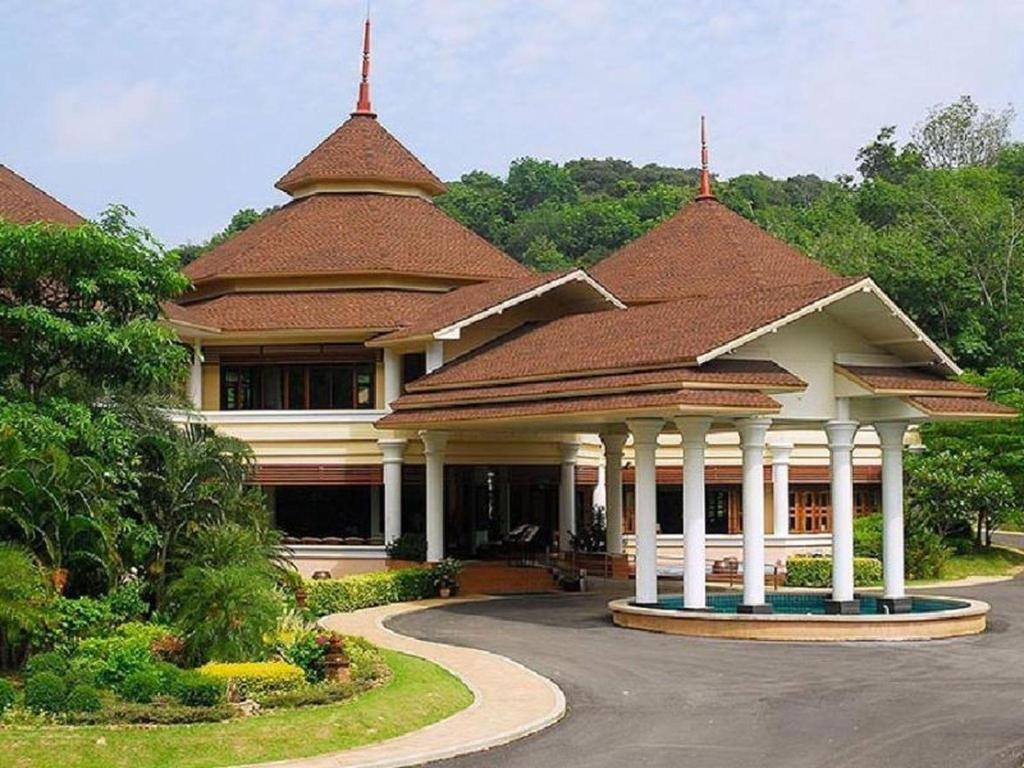 a large building with two towers on top of it at Hotel and Beach Bungalow at Lanta Resort in Ko Lanta
