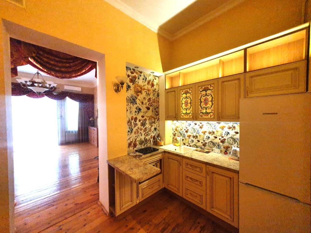 Η κουζίνα ή μικρή κουζίνα στο Appartment Grecheskaya 45/40