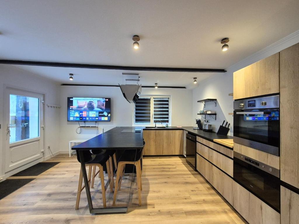 Kuchyň nebo kuchyňský kout v ubytování maison idéale déplacement 4 ou 5 personnes