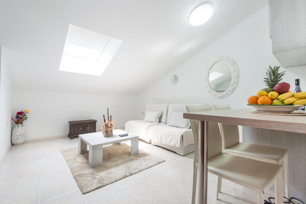 A bed or beds in a room at Apartments Babilon