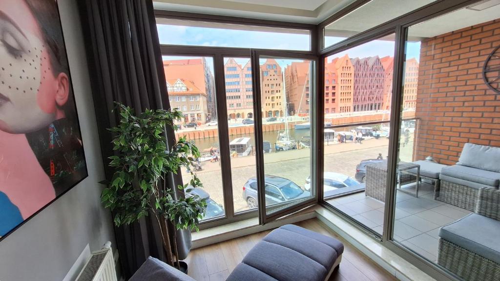 Ein Sitzbereich in der Unterkunft Waterlane Riverside - SPA, Pool, Gym &amp; Parking by Downtown Apartments