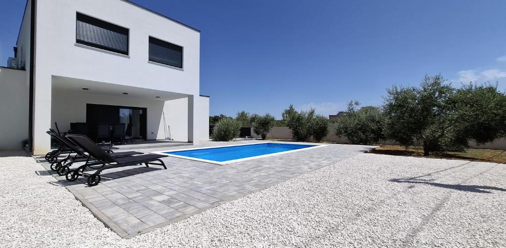 Πισίνα στο ή κοντά στο MB House