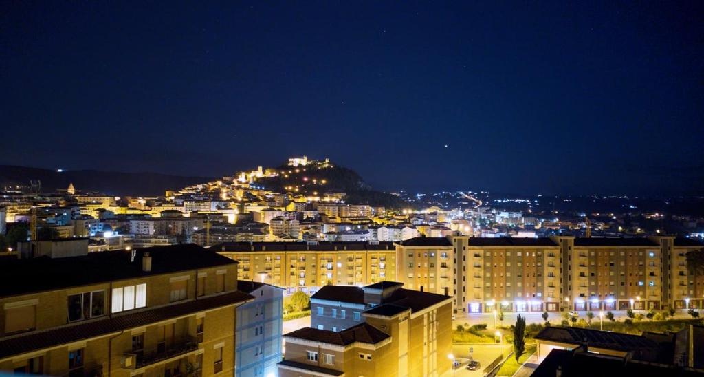 a view of a city at night at B&B Ciocca II in Campobasso