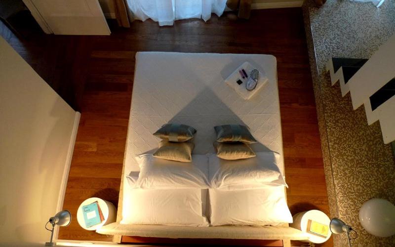 Postel nebo postele na pokoji v ubytování B&B Casa Fenoglio