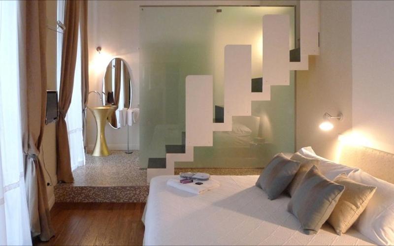 Postel nebo postele na pokoji v ubytování B&B Casa Fenoglio