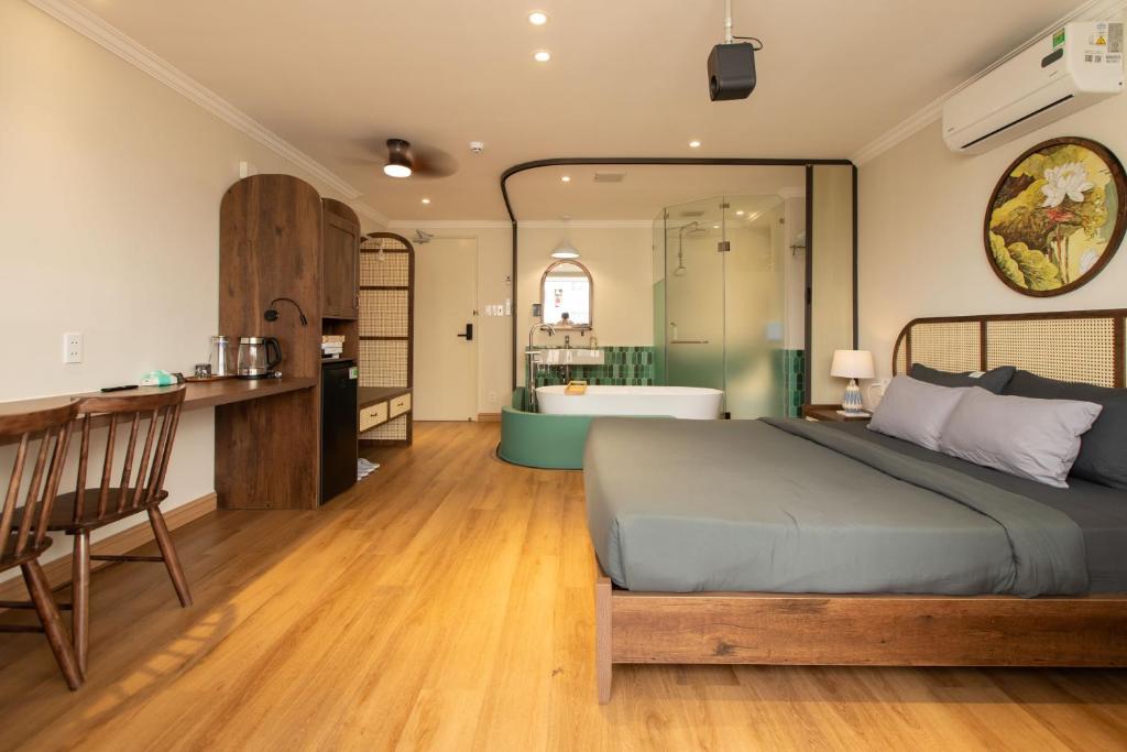 Ένα ή περισσότερα κρεβάτια σε δωμάτιο στο Ann Concept - Self service Homestay