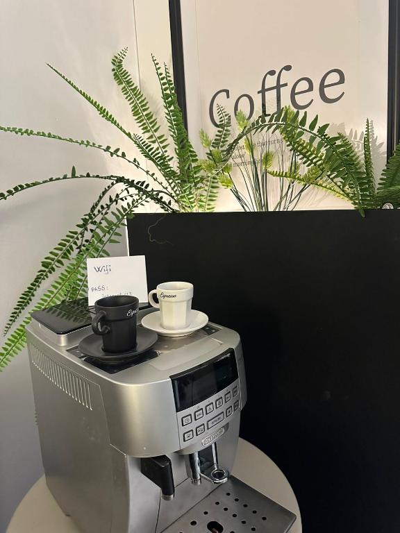 Kemudahan buat kopi dan teh di Lux Apartament