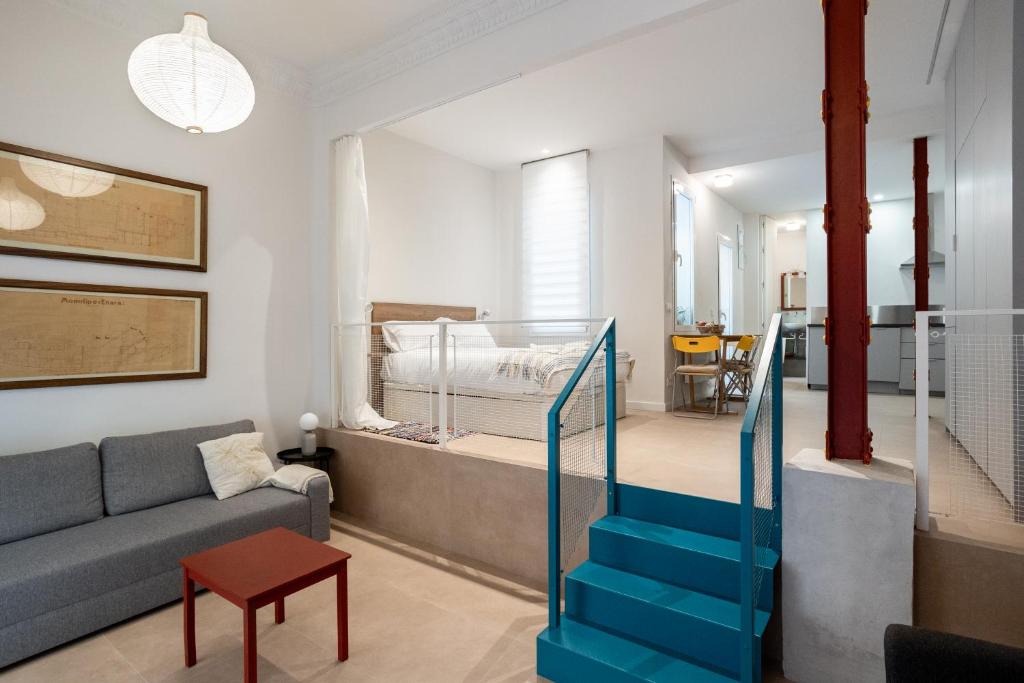 Postel nebo postele na pokoji v ubytování Premium loft in the center of Madrid, Casa García