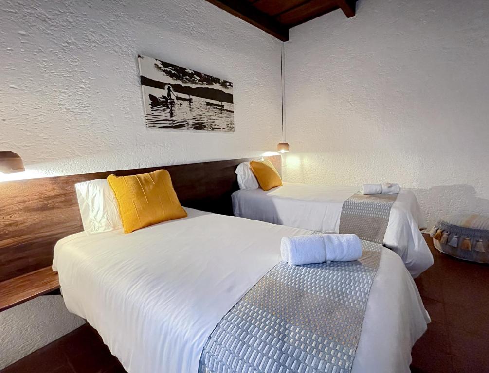 Postel nebo postele na pokoji v ubytování Villa Dulé - Habitaciones