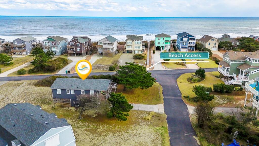 an overhead view of a beach address sign in front of the ocean at 2047 - Secret Spot in Duck