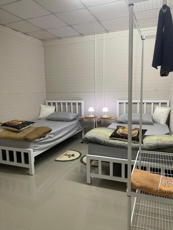 Postel nebo postele na pokoji v ubytování Sphinx room