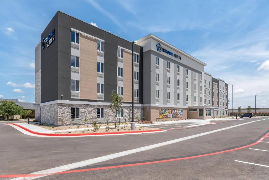 a rendering of a hotel building with a parking lot at Everhome Suites Amarillo West - Medical Center by Choice Hotels in Amarillo