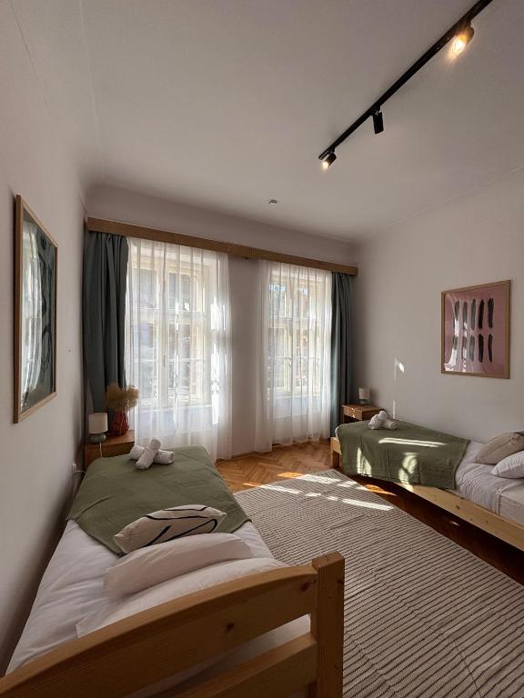 Ένα ή περισσότερα κρεβάτια σε δωμάτιο στο Menta Home