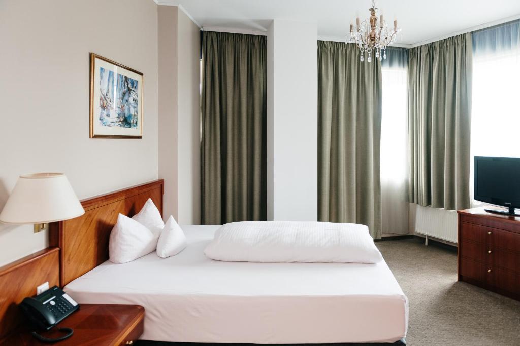 ROSS Hotel nähe Messe Stuttgart - Resim 1