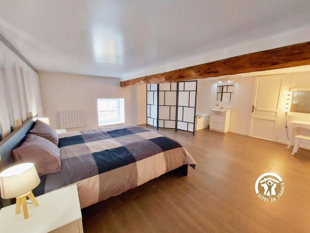 Ένα ή περισσότερα κρεβάτια σε δωμάτιο στο Les Bruyères