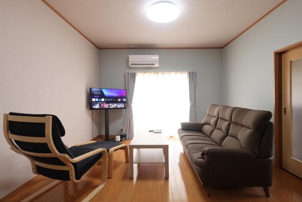 Χώρος καθιστικού στο Guesthouse KEN