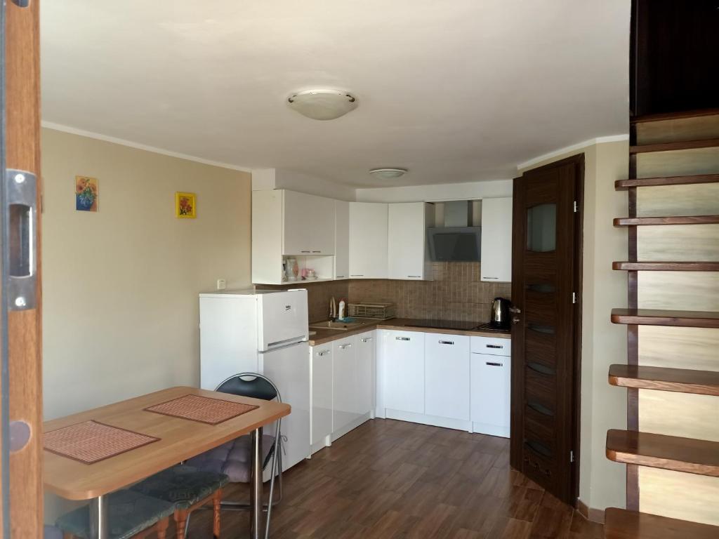 Η κουζίνα ή μικρή κουζίνα στο Domek na Leśnej