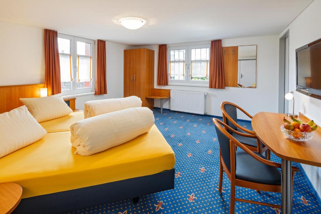 Kuchyň nebo kuchyňský kout v ubytování Seemöwe Swiss Quality Hotel