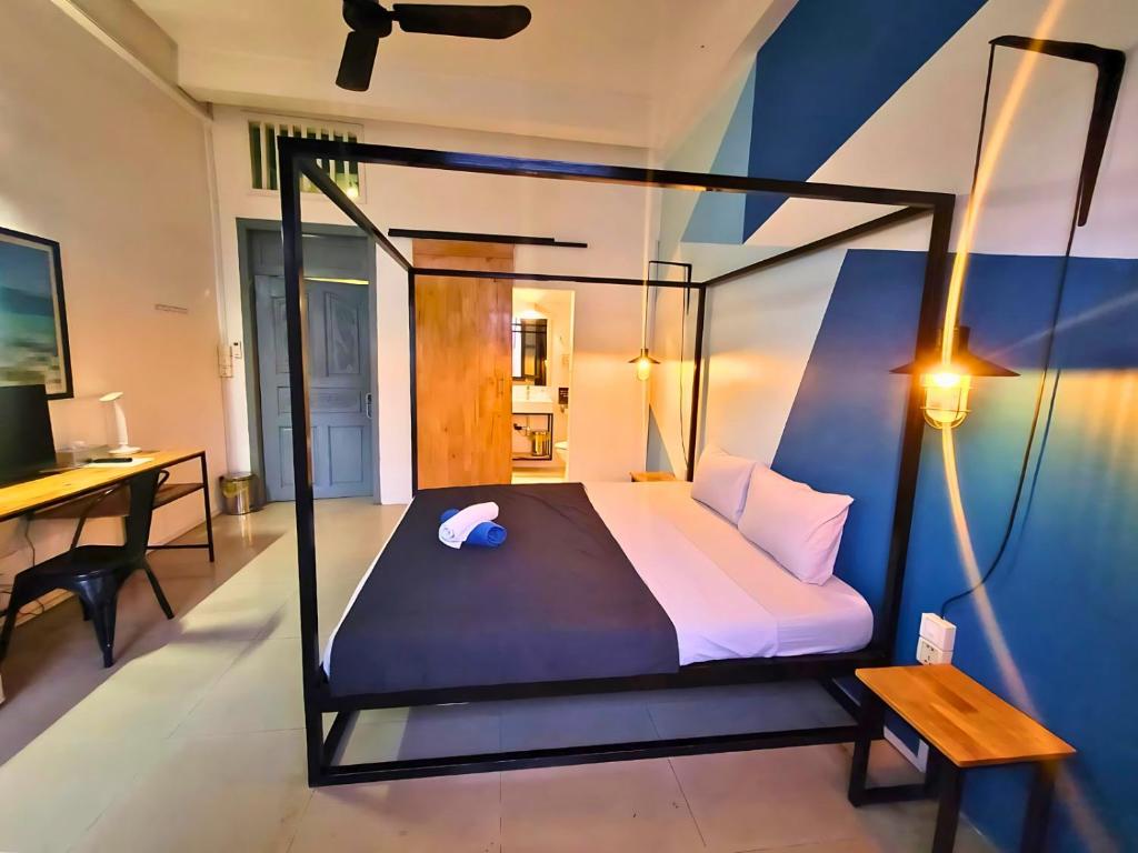 Postel nebo postele na pokoji v ubytování THE PLACE Hostel Battambang