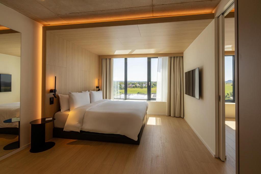Voodi või voodid majutusasutuse NOTO Hotel toas