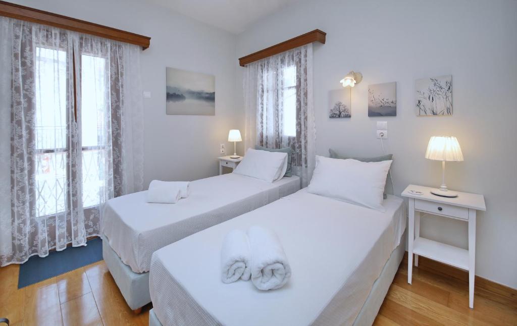 Ένα ή περισσότερα κρεβάτια σε δωμάτιο στο RODIANNA HOUSE