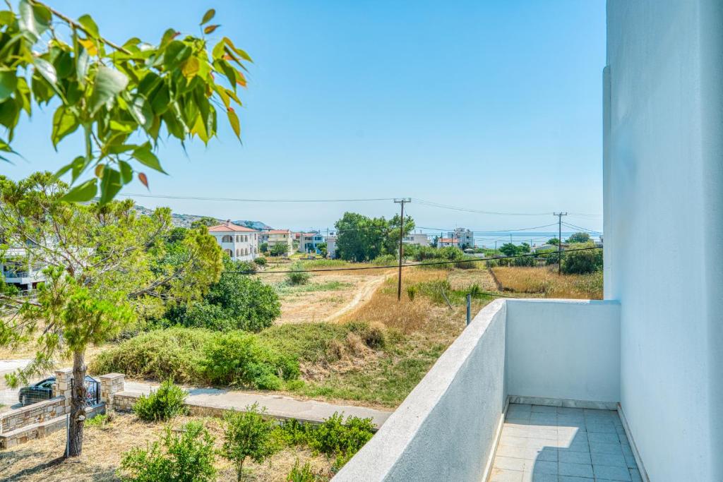 a view from the balcony of a house at Vergici Apartment 2 in Kómi