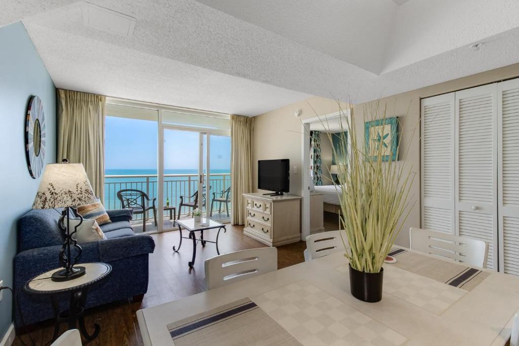 a living room with a view of the ocean at 2ND Wind by StayMareni - 2Bed-2Bath Oceanfront Suite in Myrtle Beach