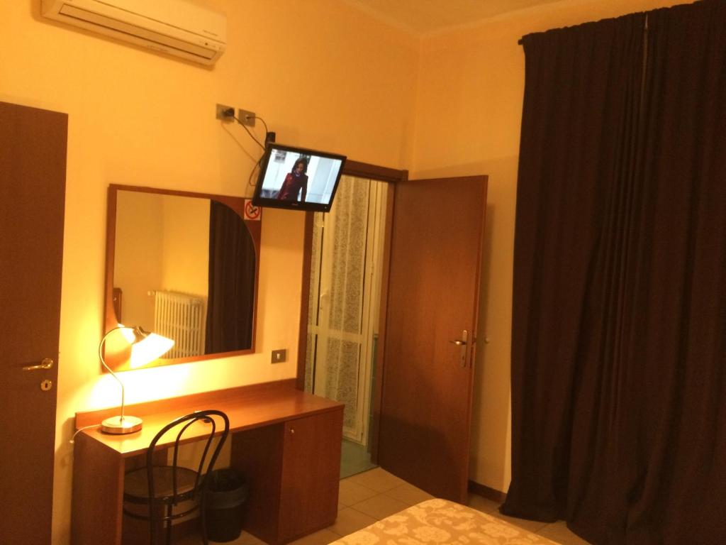 TV a/nebo společenská místnost v ubytování Hotel Paradiso