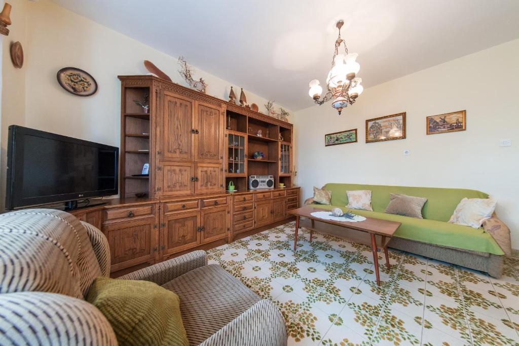 TV a/nebo společenská místnost v ubytování Apartment Ciba