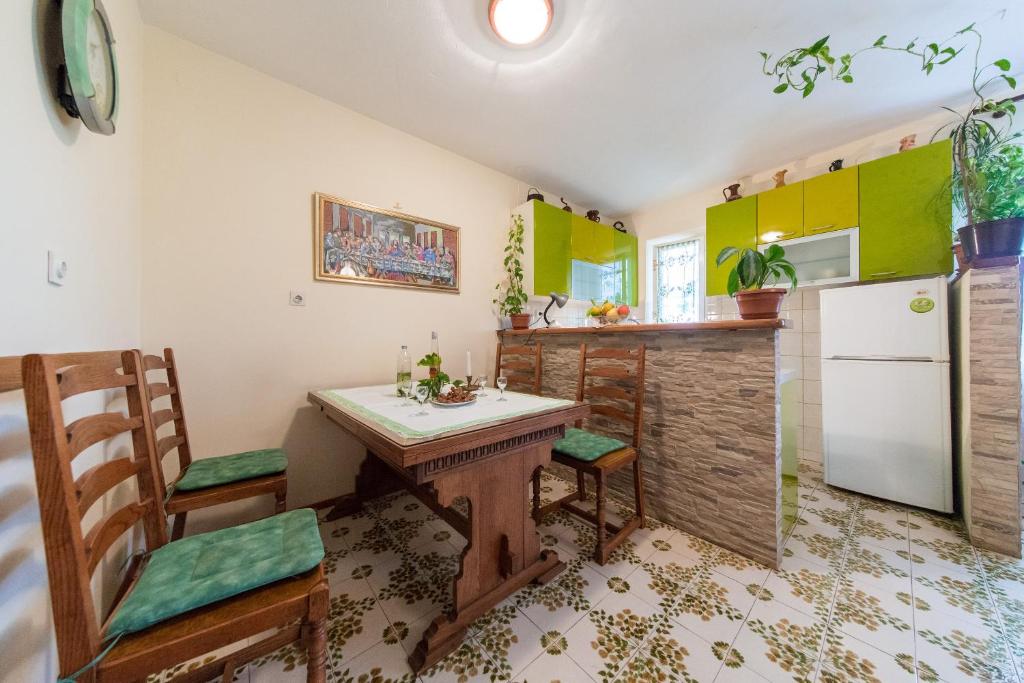 Kuchyň nebo kuchyňský kout v ubytování Apartment Ciba