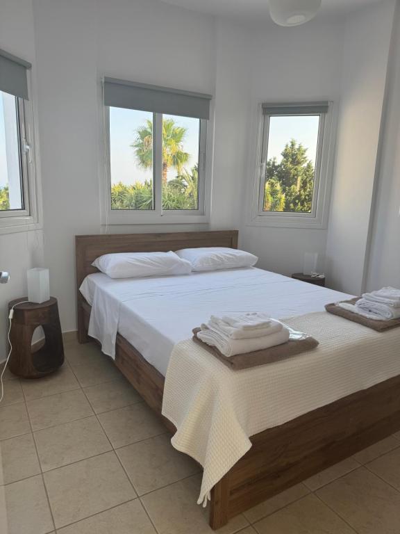 Una cama o camas en una habitación de Villa Quadralea