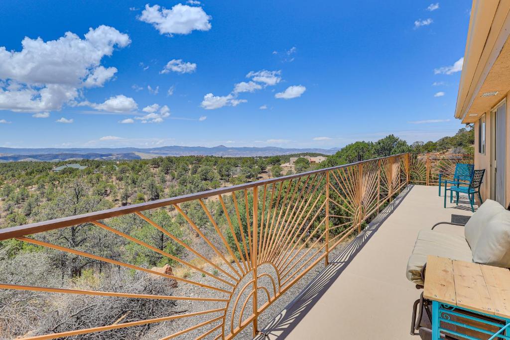 a balcony with chairs and a view of the mountains at Panoramic Vistas and Pergola Silver City Escape! in Silver City