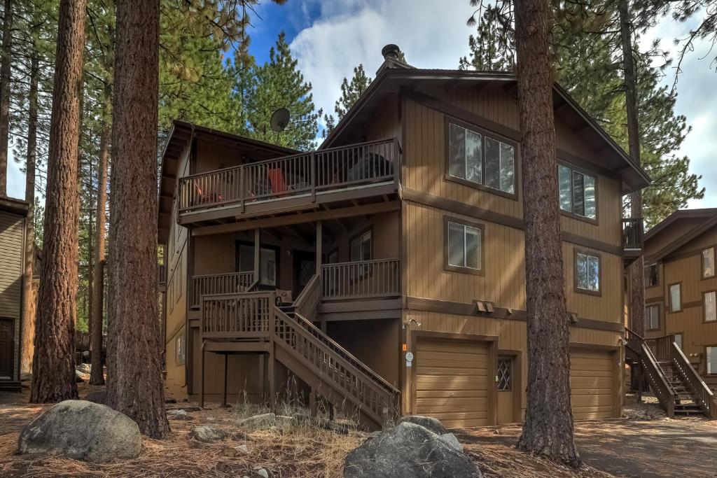 a house in the woods with trees at Family Fun Getaway - 3 Story Condo in Zephyr Cove
