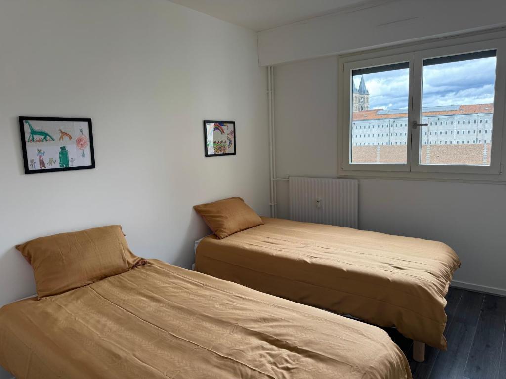 Postel nebo postele na pokoji v ubytování Spacieux T4 avec Vue sur Seine