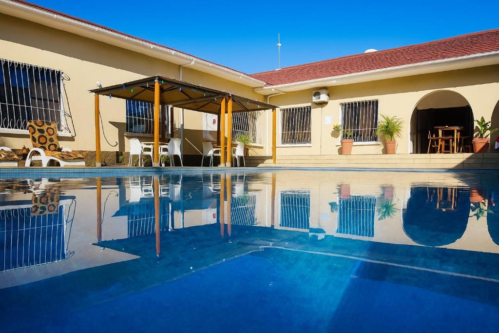 Πισίνα στο ή κοντά στο BOUGAINVILLA Boutique Hotel & Restaurant