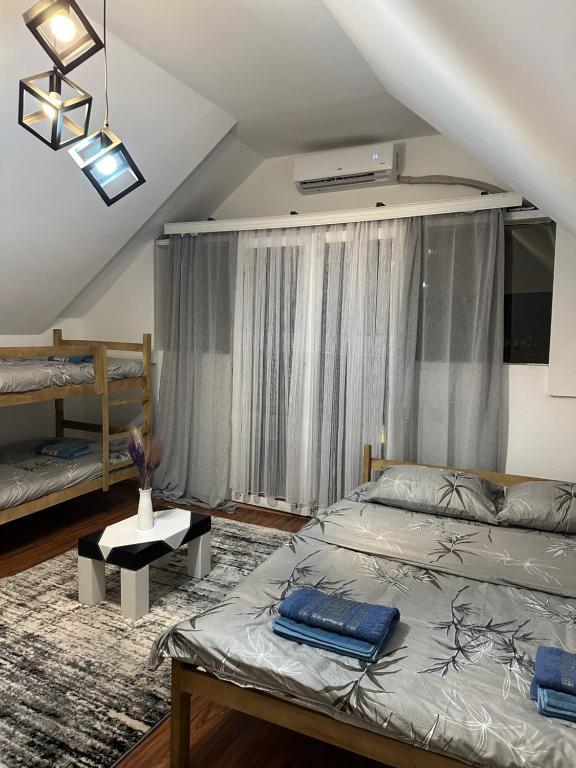 Ένα ή περισσότερα κρεβάτια σε δωμάτιο στο Villa ENA