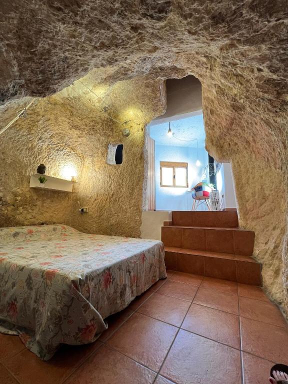 Postel nebo postele na pokoji v ubytování monmossen bocairent