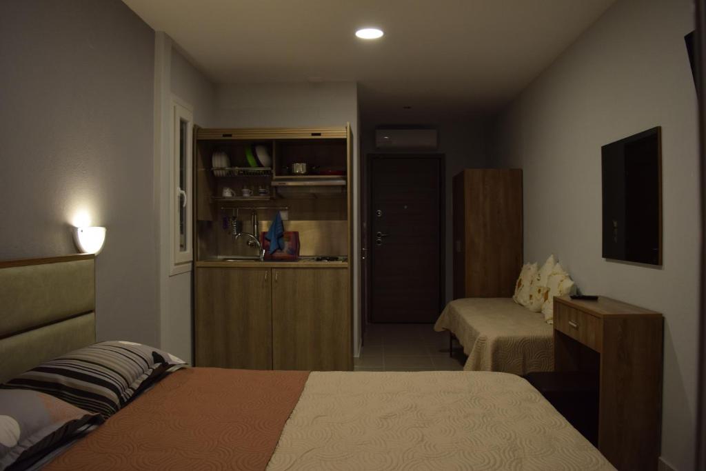 A bed or beds in a room at Littore Maris