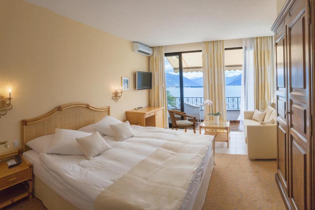 Postel nebo postele na pokoji v ubytování Boutique Hotel La Rocca