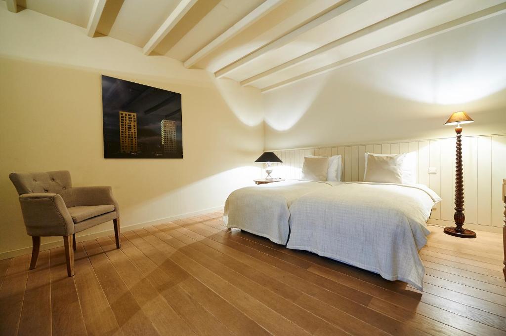 Postel nebo postele na pokoji v ubytování B&B Maryline