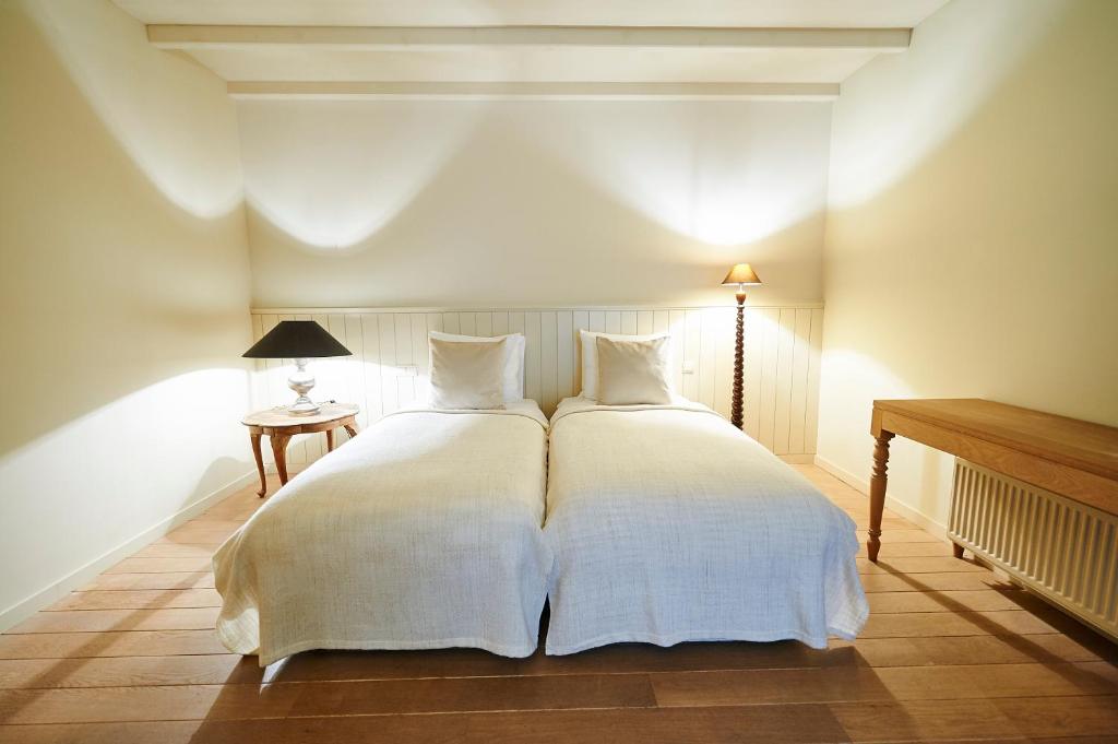 Postel nebo postele na pokoji v ubytování B&B Maryline