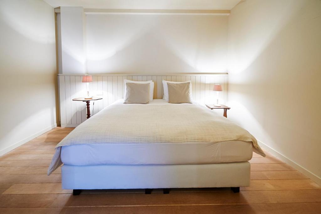 Postel nebo postele na pokoji v ubytování B&B Maryline