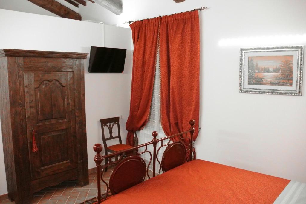 Postel nebo postele na pokoji v ubytování Antiche Dimore San Felice