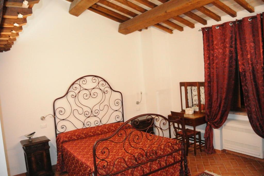 Postel nebo postele na pokoji v ubytování Antiche Dimore San Felice