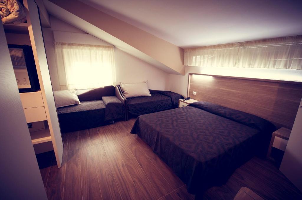 Hotel Fini - Superior Vierbettzimmer