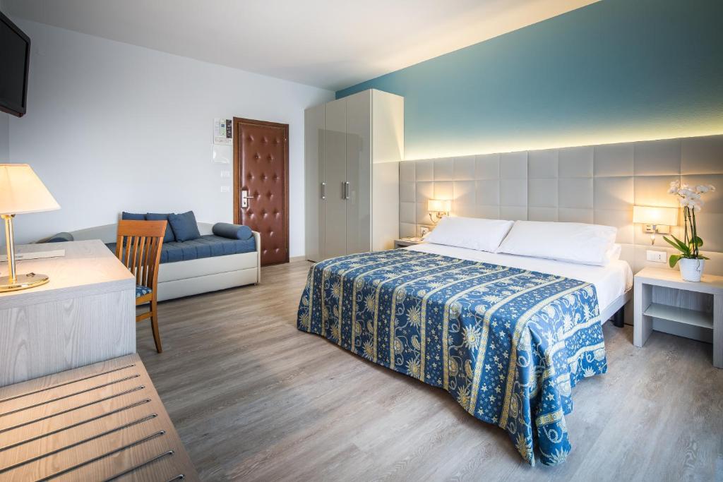 Postel nebo postele na pokoji v ubytování Hotel San Giorgio