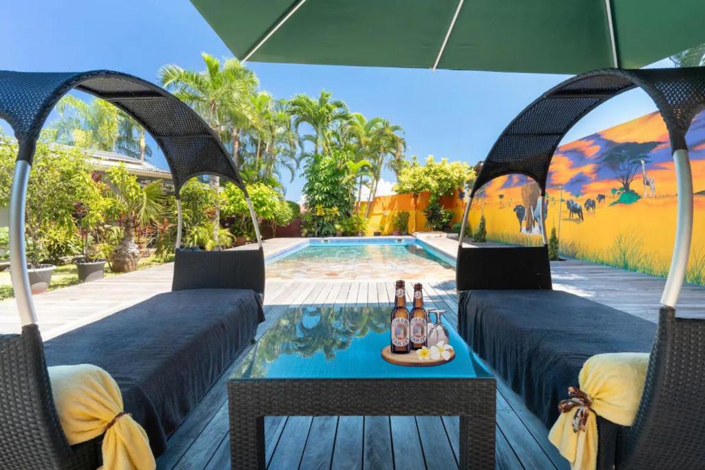 TAHITI Punaauia - Studio Tamanu Bien-Etre, Piscine, Plage 5mn, TV, Wifi - photo 11 - Tahiti, Polynésie