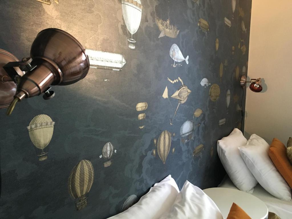 Postel nebo postele na pokoji v ubytování Hotel Wictoria