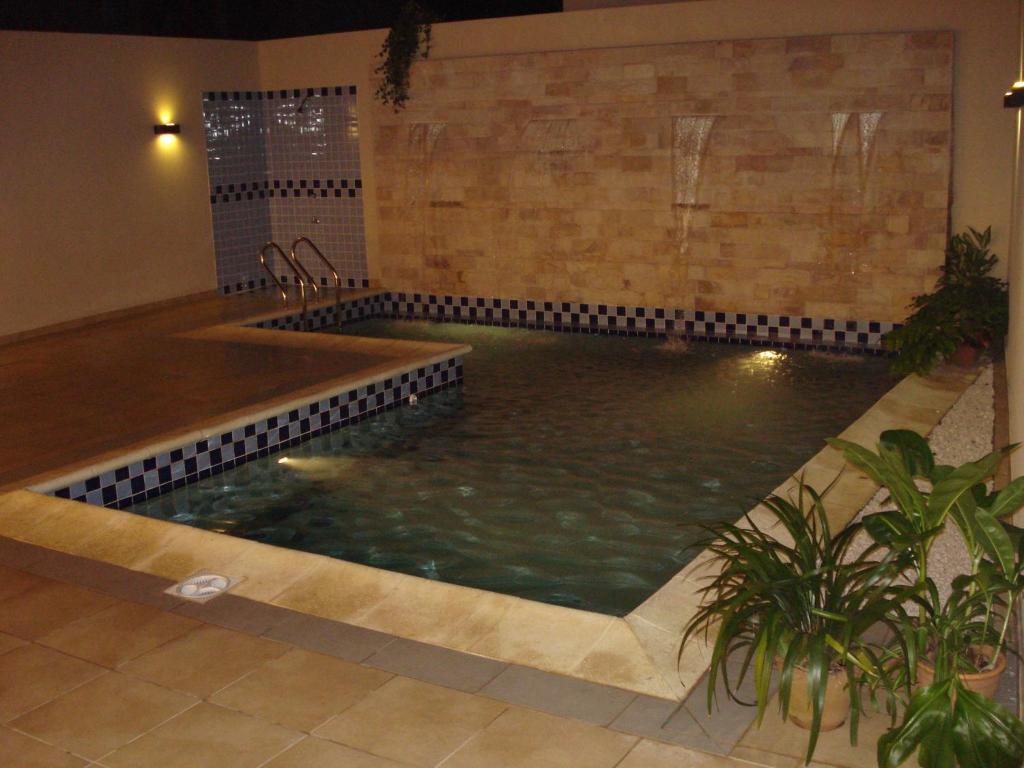 Πισίνα στο ή κοντά στο Olimpo Hotel & Suites