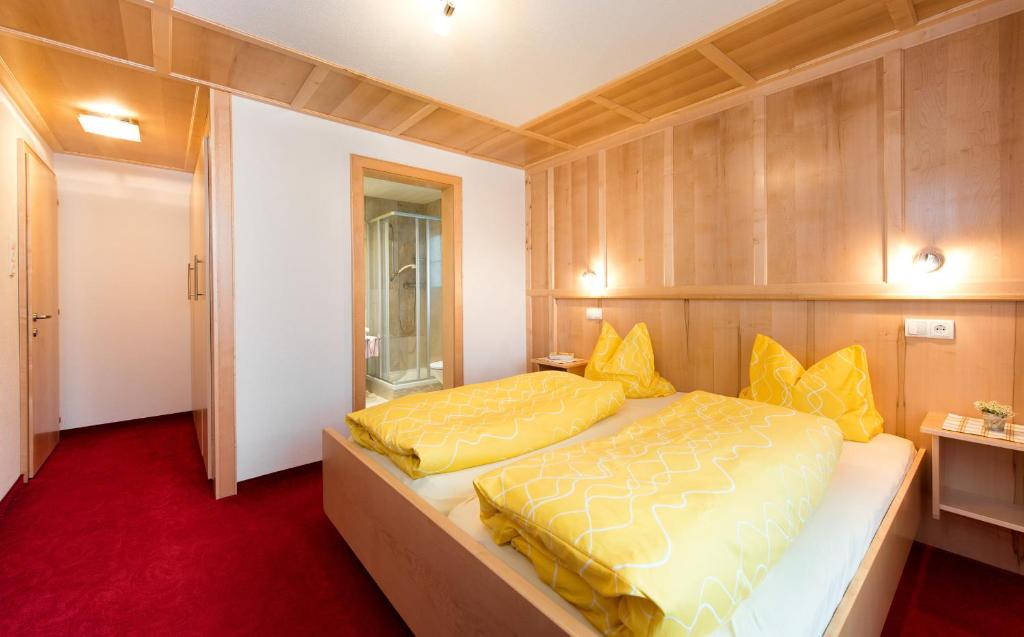 Postel nebo postele na pokoji v ubytování Tyroler Hof